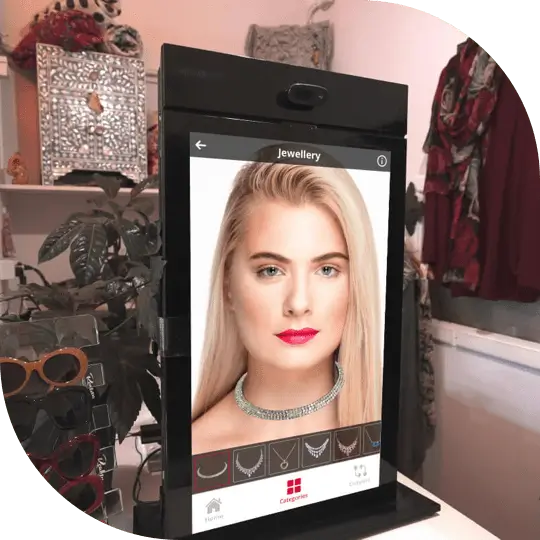 Virtual try-on feature with augmented reality in smart mirrors